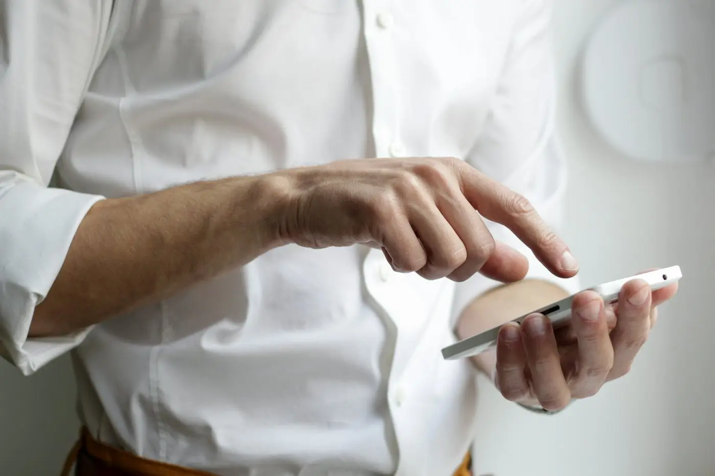 A person reading a message on a smartphone